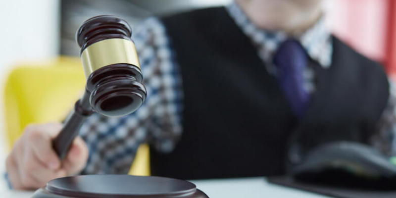 Auctioneer holding a gavel