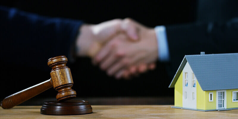 Hand shake over a property auction deal: Do houses usually sell at auction?