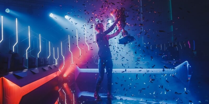 Image of a winner on stage - not quite what happens when you win a house at auction, but you get the idea. 