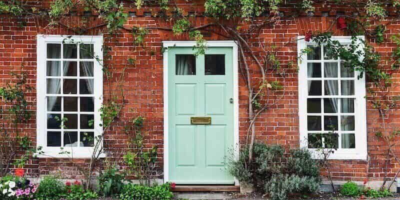 What are the initial costs when you inherit a property. View of a beautiful house exterior and front door.