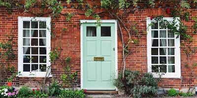 View of a Beautiful House Exterior and Front Door. Subsidence and insurance, FAQs, Common Exclusions and Top Tips.