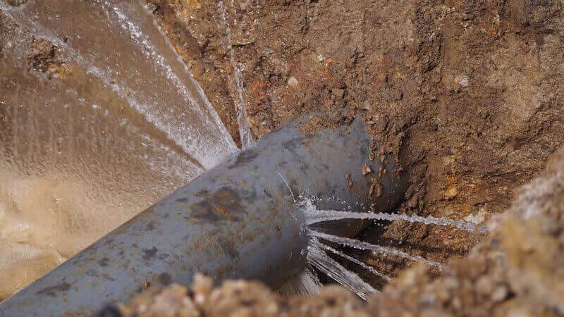 A picture of a burst water pipe. 