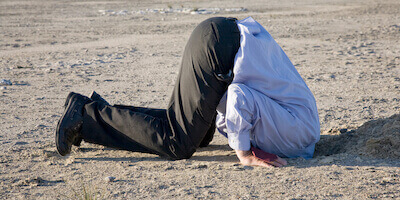 Man burying his head in the sand. What are the main signs of subsidence and why you shouldn't ignore them.