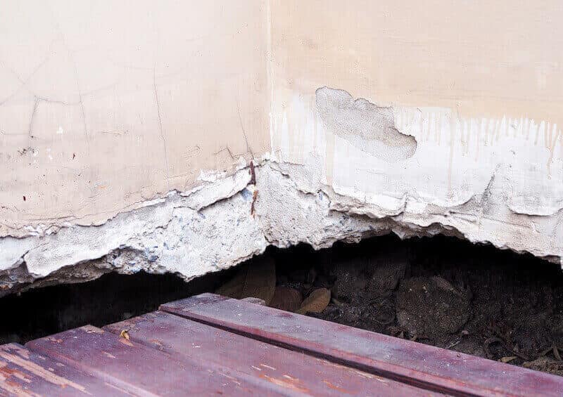 Sinking floorboards signalling subsidence.