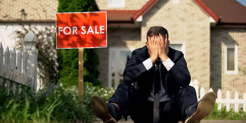 Seller sat on the floor upset outside house because house is not selling. Do people buy houses with subsidence?