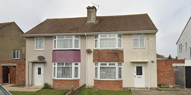 A google maps street view image of Laing Easiform semi detached houses with bay windows. Laing Easiform houses, the complete guide.