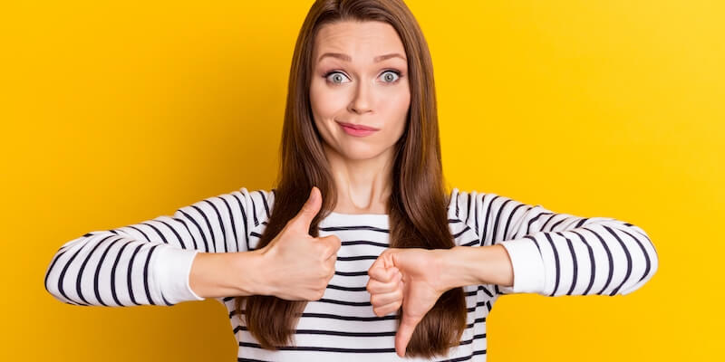 Unsure lady with thumbs up and thumbs down. Is modern auction any good?