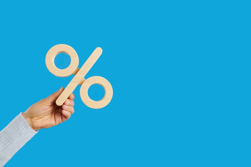 A percentage sign on a blue background.