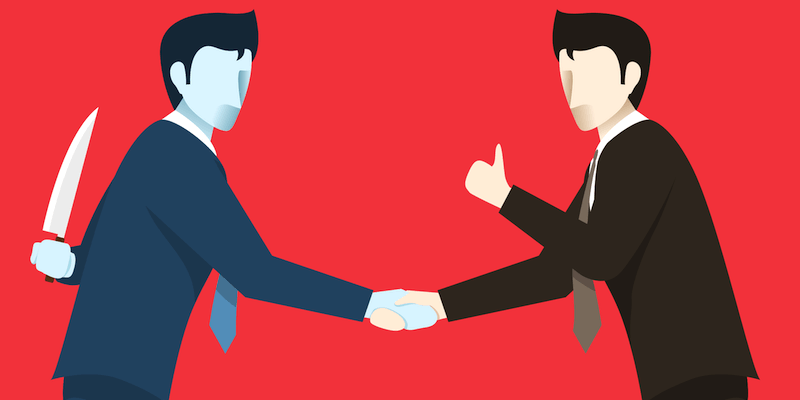 Image showing a business man hiding a knife behind his back. Not all cash house buyers are legit!